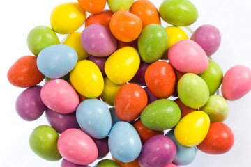 Candy coated chocolate mini Easter eggs on white