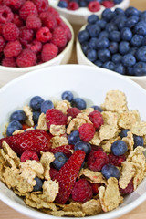 Bowl of Healthy Breakfast Cereals With Selection of Berries