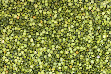 Abstract background texture with dry green peas