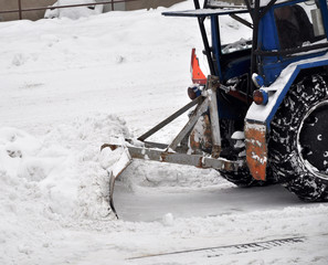 tractor cleaning the road