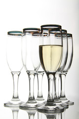 Wine goblets on mirror table