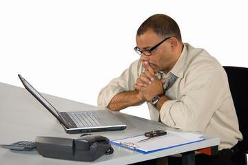 Naklejka premium concentrated working mature Afro-American businessman