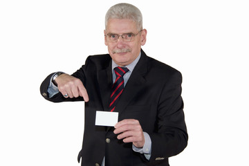 senior businessman pointing at business card