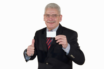 smiling senior businessman with card posing with thumbs up