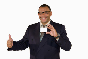 African-American businessman with card posing with thumbs up