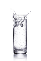 water splash in a glass.  isolated on white