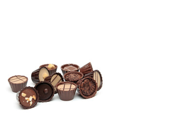 Mixed Chocolates on white with copy space