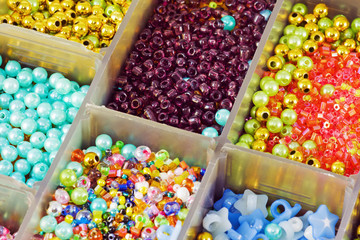 colored beads in a box