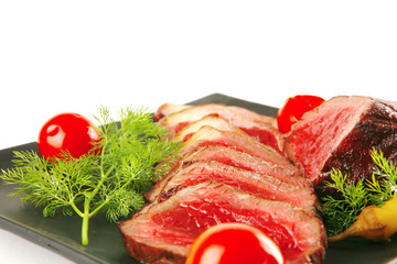 sliced fresh meat on dark