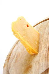 edam cheese on wood