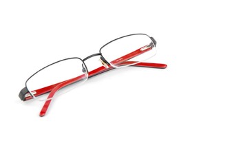 Red spectacles on white