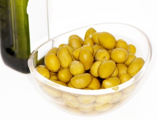 Olives and bottle of olive oil