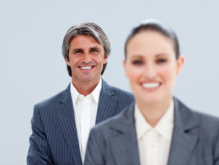 Close-up of a mature businessman and his colleague