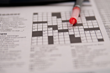 Pen and Crosswords from a newspaper