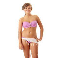 Naklejka premium Summer girl in pink swimwear