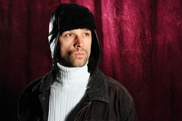 young man with coat cap