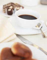 Soft-focused cup of morning black coffee