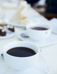 Soft-focused cup of morning black coffee