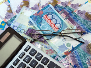 Calculator and paper money in Kazakhstan