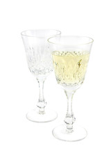 Set from two wine glasses, one full and one empty