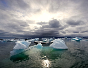 Turbulent sunset over Jokulsarlon Glacier Lake