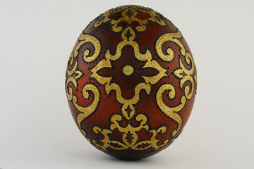 Painted Easter egg with decorative ornament