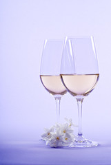 Two Glasses of White Wine and a Bunch of White Narcissus