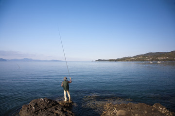Fototapeta na wymiar Old man fishing.Minamata.Kumamoto.Japan