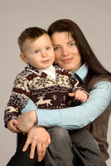 Smiling young mother with son