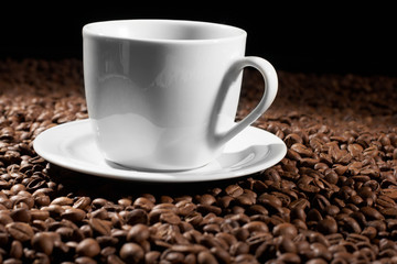 Cup with coffee, costing on coffee grain