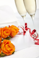 Roses and glasses of champagne