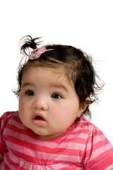 four months old baby laying on carpet over white
