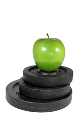 Apfel auf Hantelscheiben