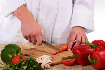 Cook cuts carrots