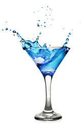 Blue curacao cocktail with splash isolated on white