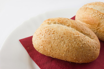 Bread Rolls on a red napkin closeup shot