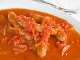 Sausages in tomato sauce.