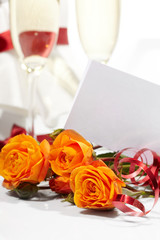 Roses and glasses of champagne