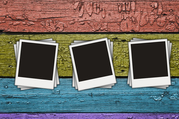 Fototapeta premium blank photos on wooden planks
