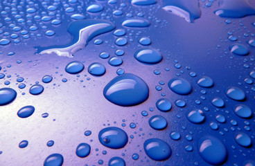 water drops on blue background macro