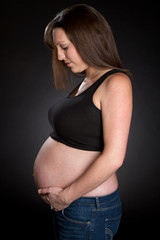 Woman Holding Pregnant Belly