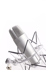 Professional studio microphone on white background
