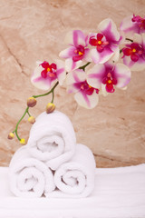 Obraz na płótnie Canvas Spa towels with orchid