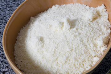 Metal bowl with soft cheese. preparing pastry