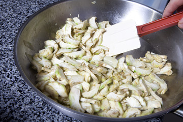 Prepared fried  artichokes. Preparing pastry
