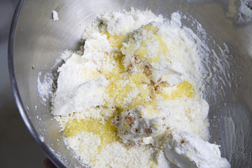 pouring milk in pastry. Preparing pastry