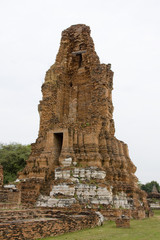 Old stone buddhist stupa in Ayutthaya, Thailand.