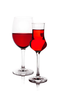 Two wine-glasses with red wine