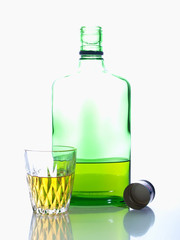 Green bottle on a gleam