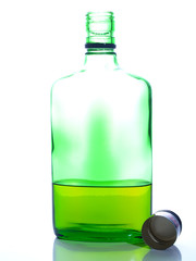 Green bottle on a gleam